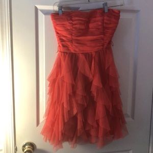 Strapless coral ruffled dress
